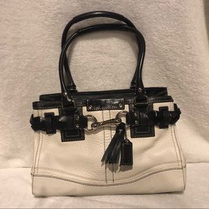 White Leather Coach Purse with Black Accents.